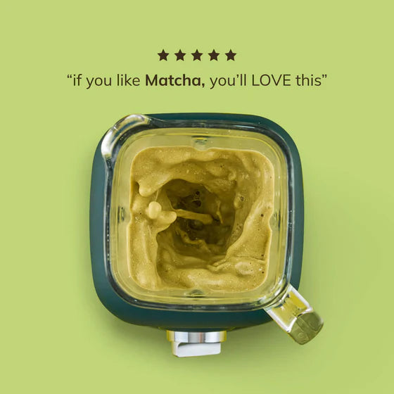 A shaker bottle or glass or blender filled with a green Ka'Chava Matcha shake, ready for consumption, symbolizing quick and healthy nutrition