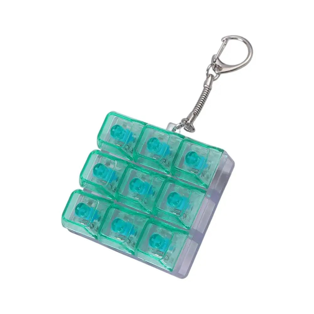 Lightweight Versatile Decompression Keychain Fingertip Press Luminous Button Toy Protable 9-key Keyboard Relieve Anxiety Toys Peaceful Pleasures Health and Wellness green