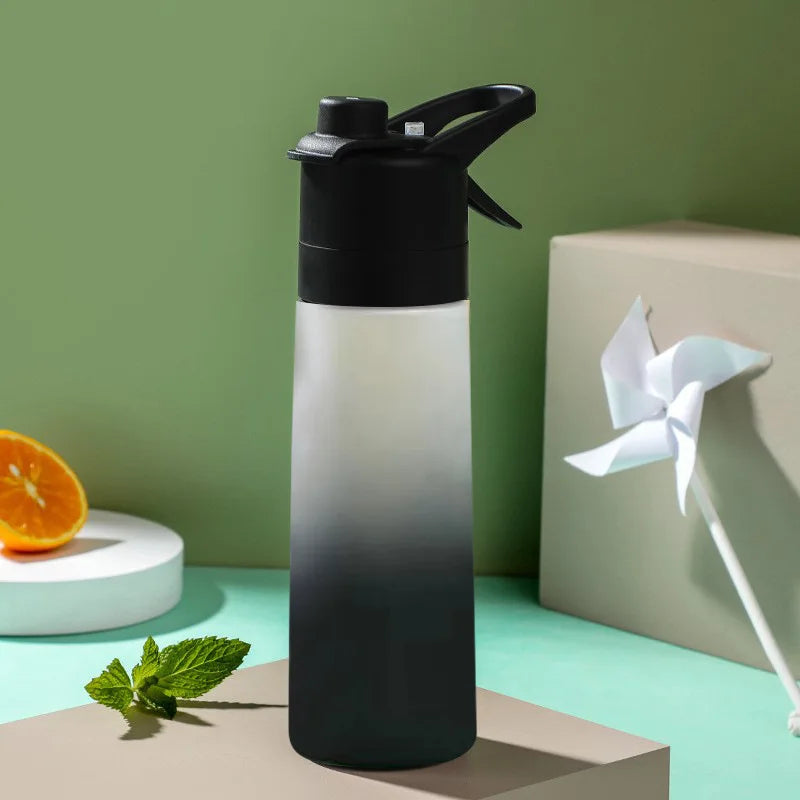 700ml BPA-Free Spray Water Bottle – Leakproof & Portable