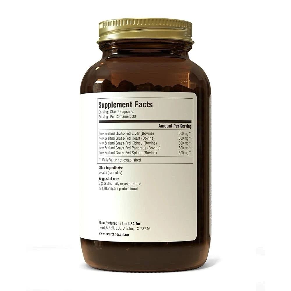 Supplement bottle with gold cap and label on a white background