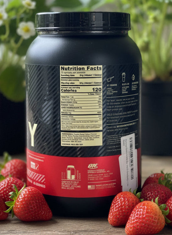 Optimum Nutrition Gold Standard label showing 24g protein, 5.5g BCAAs, and the high WPI content.