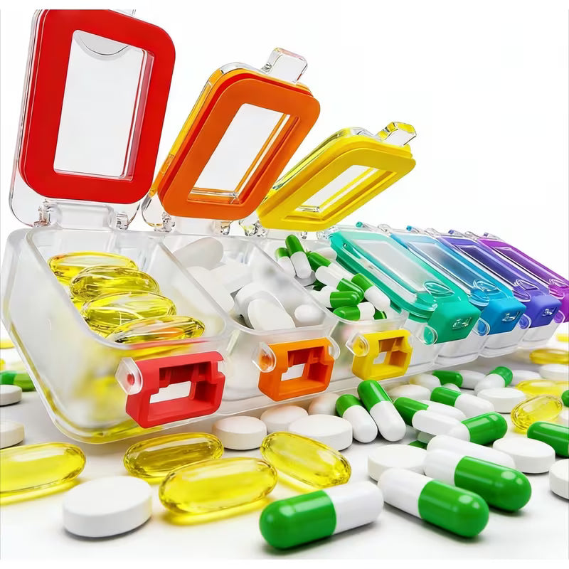 Colorful pill organizer with various pills on a white background