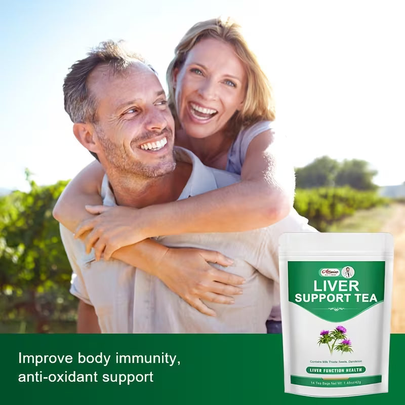Couple enjoying a sunny day outdoors with a product for liver support tea in the foreground.