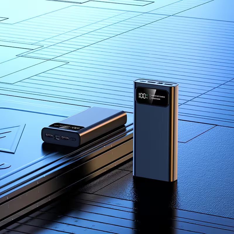 Two power banks on a reflective surface with a blue geometric background