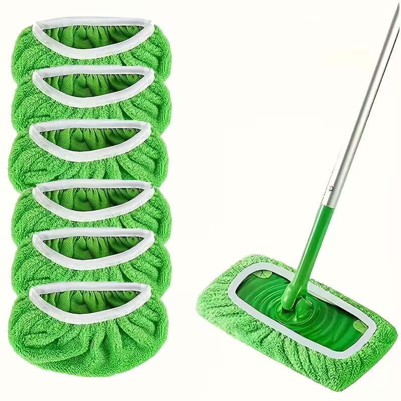 Set of green microfiber mopping cloths with a mop on a white background
