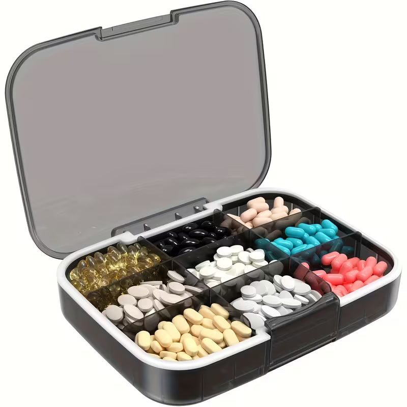 Multivitamin container with various colored pills on a white background