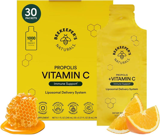Beekeeper's Naturals Propolis Vitamin C supplement packaging with honeycomb and orange slices on a white background.