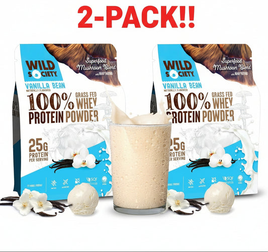 Two packages of Wild Society protein powder with a glass of vanilla bean protein shake.