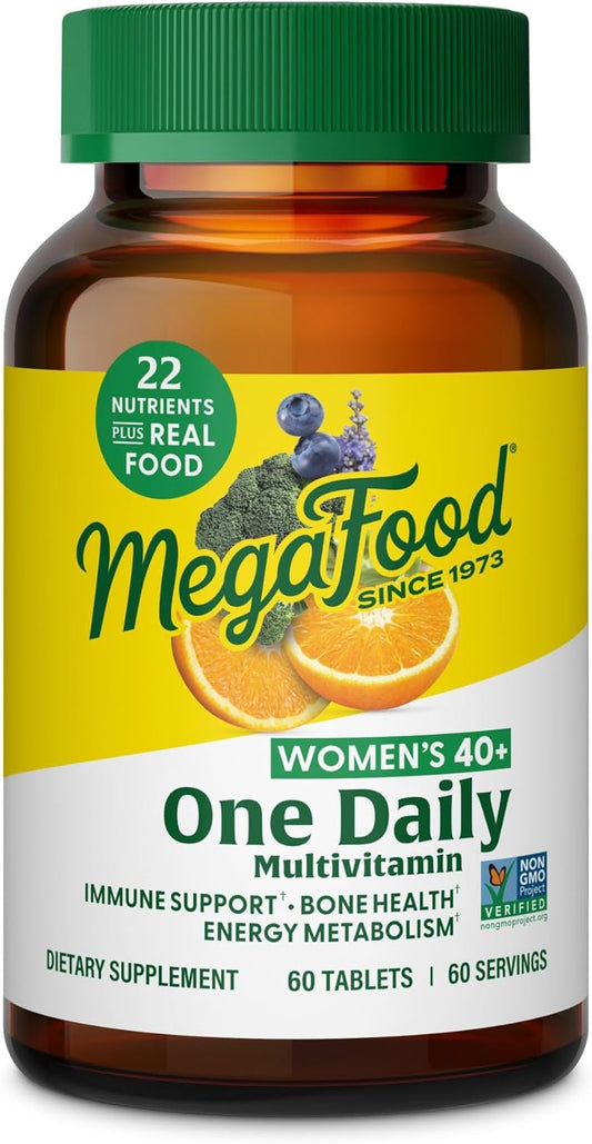 MegaFood Women's 40+ One Daily Multivitamin bottle with green cap and label.