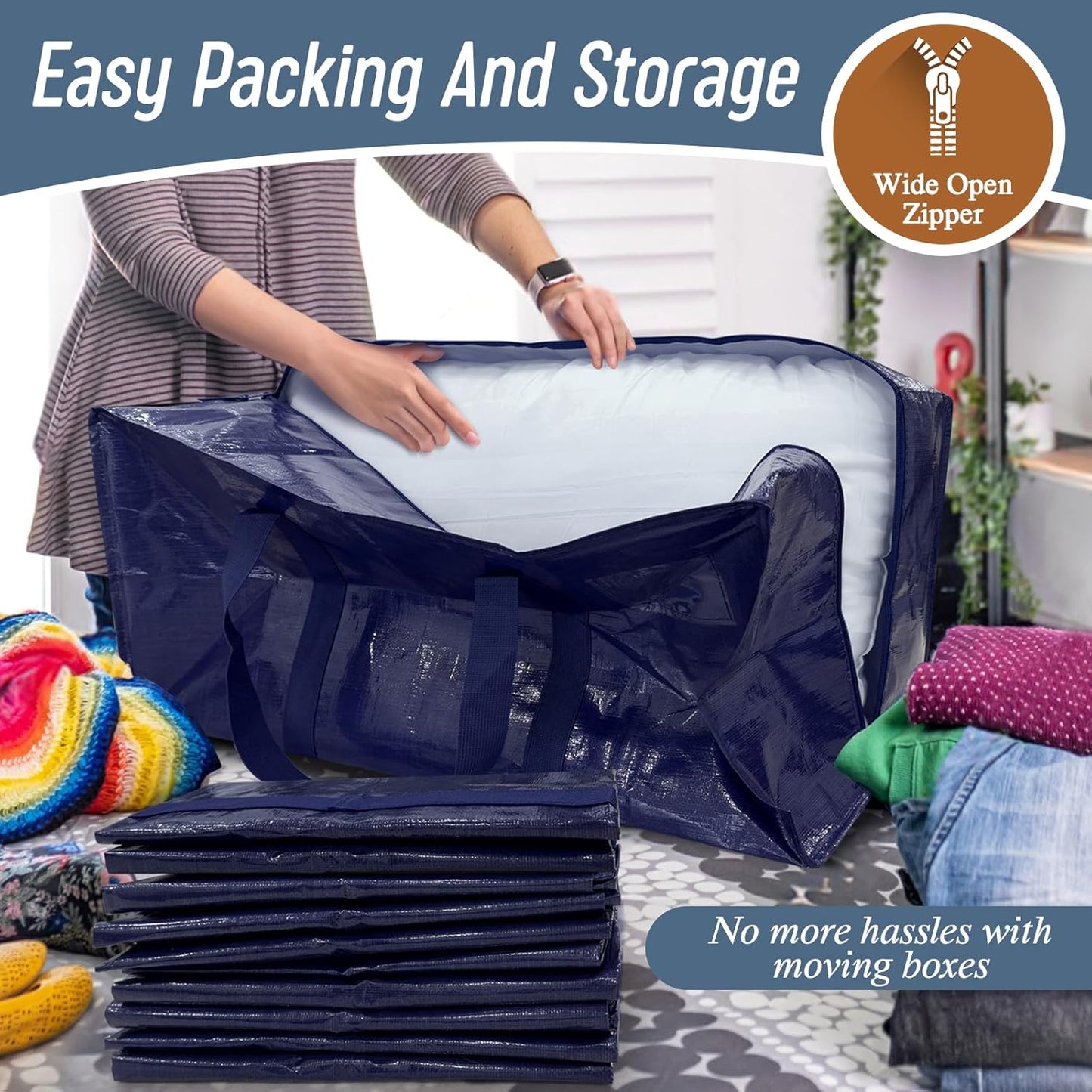 Navy blue packing bags with a wide open zipper, used for easy packing and storage, on a table with colorful items.