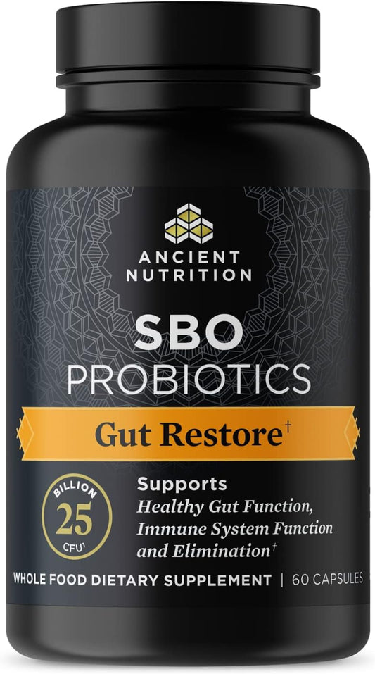 Black supplement bottle labeled 'SBO Probiotics Gut Restore' by Ancient Nutrition on a black background.