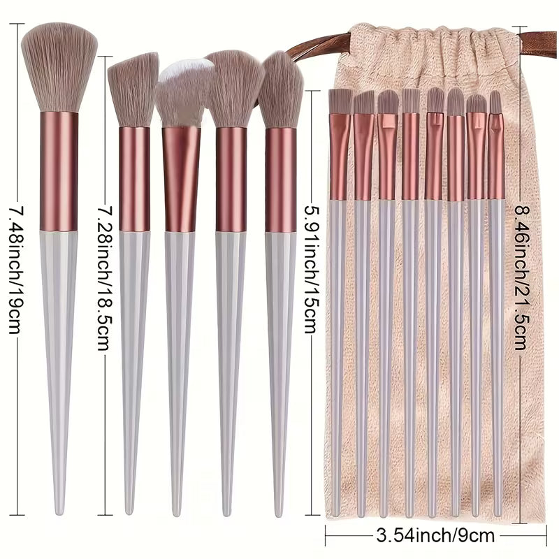 Set of makeup brushes with measurements and a pouch on a white background