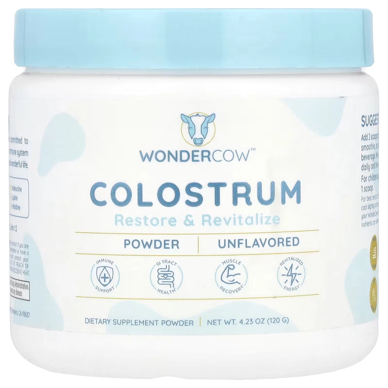 Container of WonderCow colostrum powder with a blue lid on a white background