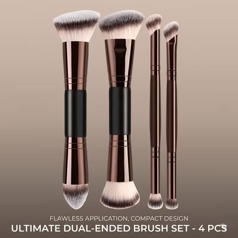 Set of four dual-ended makeup brushes with bronze and black handles on a beige background.