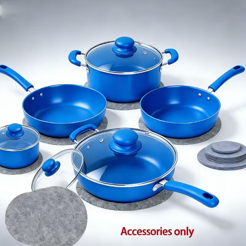 Set of blue cookware with lids on a gray background
