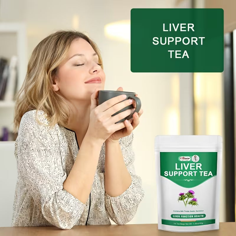 Woman holding a mug with a liver support tea package in the foreground