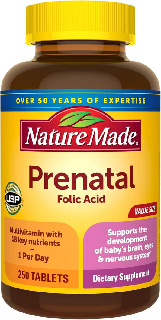 Nature Made Prenatal Folic Acid supplement bottle with yellow cap and label.