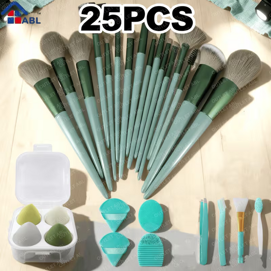 Set of 25 makeup brushes with green handles and various attachments on a wooden surface.
