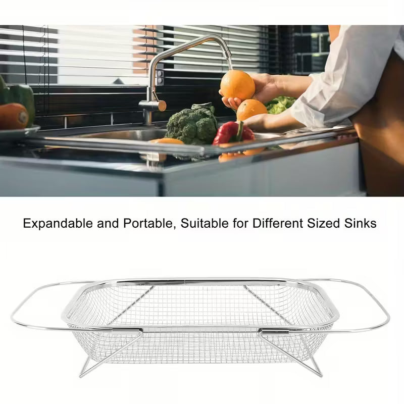 Person washing vegetables in a kitchen sink with an expandable metal mesh strainer.