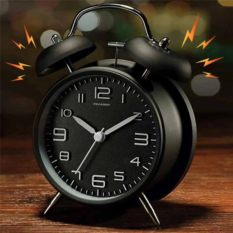 4 Inch Twin Bell Loud Alarm Clock Metal Frame 3D Dial with Backlight Battery Operate Desk Table Alarm Clock For Home and Office Peaceful Pleasures Health and Wellness