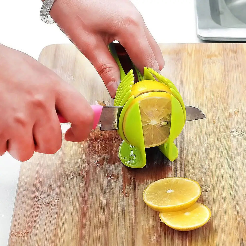 Green Handheld Plastic Potato Cutter Tomato Slicer Shreadders Lemon Cutting Holder Cooking Tools Kitchen Gadgets and Accessories Peaceful Pleasures Health and Wellness