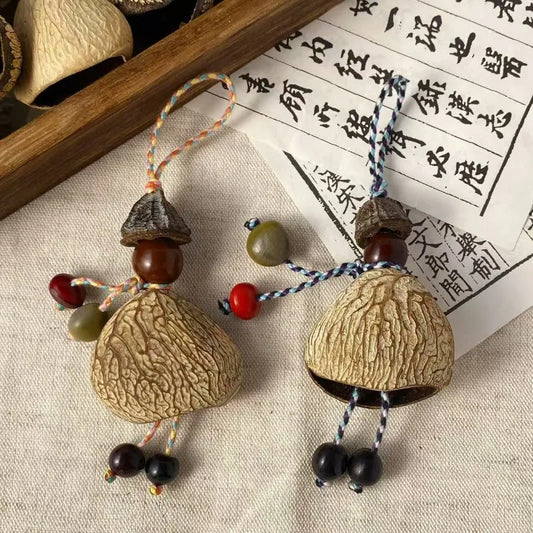 Indonesian Villain Black Fruit Shell Handmade Handbell Bag Trailer Peaceful Pleasures Health and Wellness