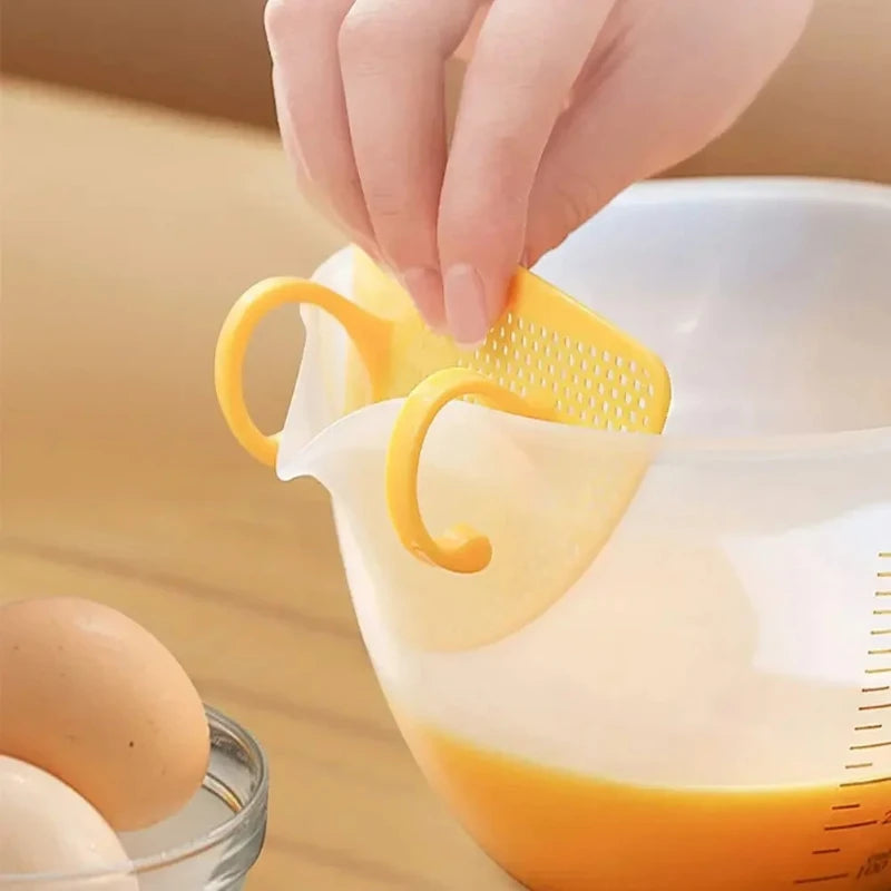 Food Grade Egg Liquid Filter Measuring Cup with Graduated and Diversion Port Egg Beater Cup for Rice Washing and Fruit Cleaning Peaceful Pleasures Health and Wellness