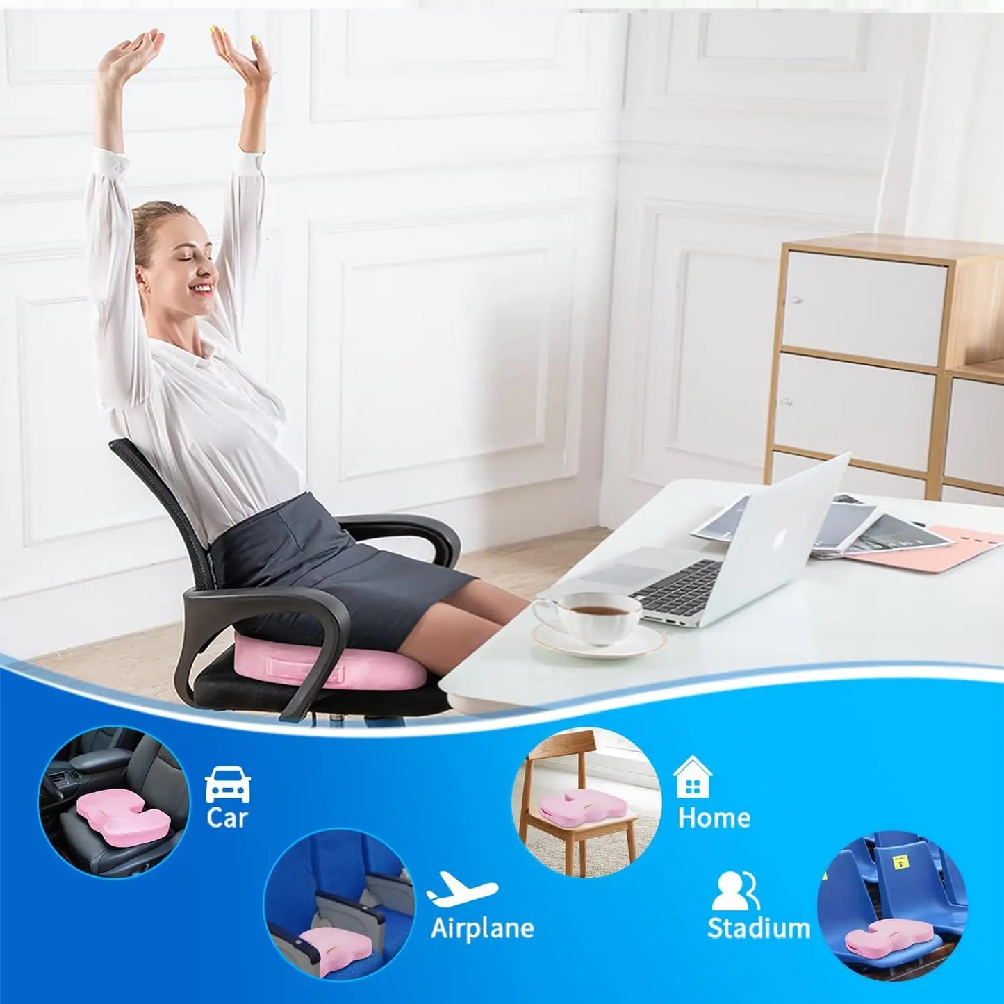Woman using a pink office chair cushion in an office setting with a desk and laptop.