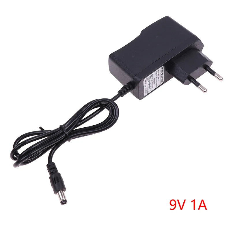 EU Plug Reverse Polarity Charger Adaptor AC 100V-240V Converter Negative Inside Switch AC DC 9V 1A 1000ma Power Adapter Supply Peaceful Pleasures Health and Wellness onesize