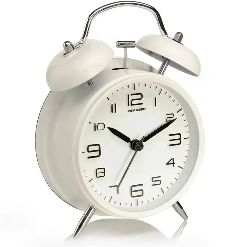 4 Inch Twin Bell Loud Alarm Clock Metal Frame 3D Dial with Backlight Battery Operate Desk Table Alarm Clock For Home and Office Peaceful Pleasures Health and Wellness white