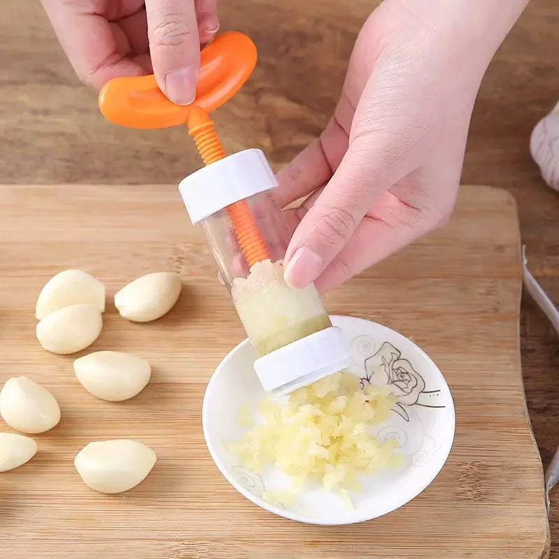 Household Manual Garlic Puree Grinder Kitchen Rotating Garlic Press Manual Garlic Squeezer Peaceful Pleasures Health and Wellness
