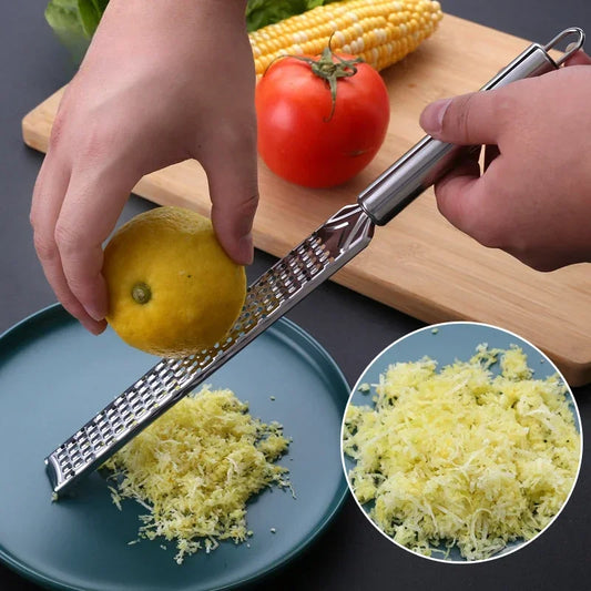 Stainless Steel Handheld Cheese Grinder Garlic Grater Vegetable Fruit Grinder Lemon Zester Citrus Ginger Cheese Grinding Tools Peaceful Pleasures Health and Wellness