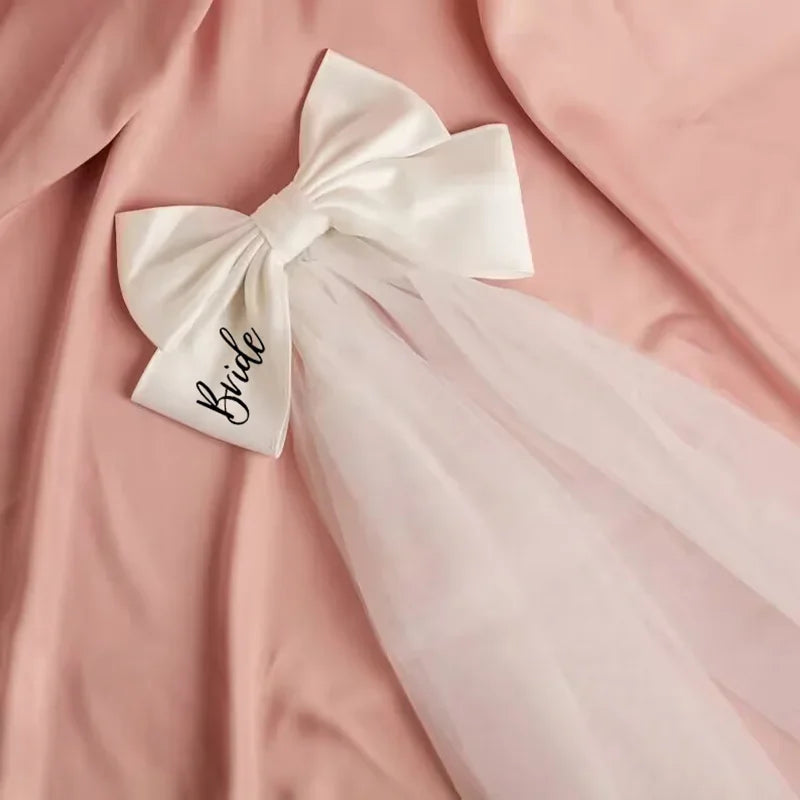 Bride Bow Veil – Bachelorette Hen Do Bridal Shower Gift Bridal Party Accessory Peaceful Pleasures Health and Wellness bride with veil