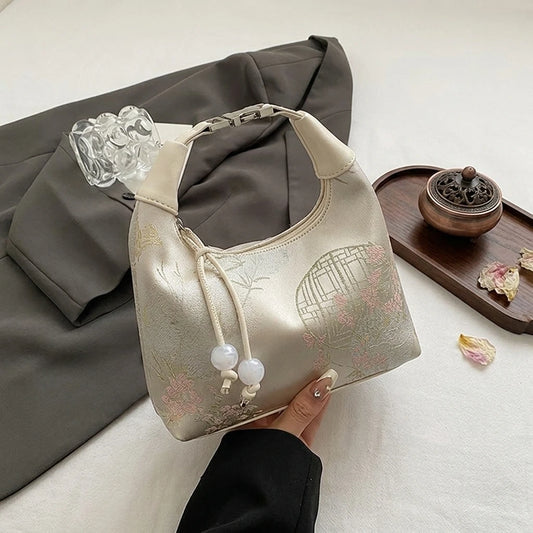 Embroidered Pea-Shaped Handbag For Women With Adjustable Strap And Traditional Design Peaceful Pleasures Health and Wellness