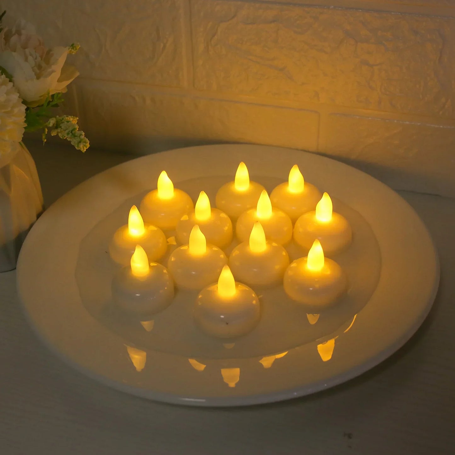Flameless LED Floating Candles Battery Operated Tealights Romantic Warm White Light for Pool Bathtub Hot Bath Wedding Centerpiec Peaceful Pleasures Health and Wellness 35X40MM 12 Pack