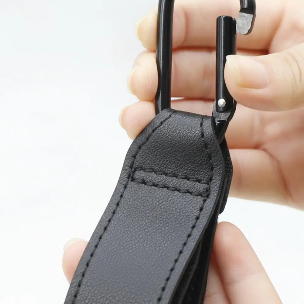 2Pcs PU Leather Stroller Hooks Versatile Stroller Handle Hanger Diaper Bag Purse Grocery Organizer Hook Stroller Accessories Peaceful Pleasures Health and Wellness