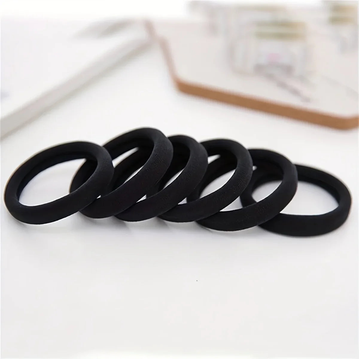 50-Pack Black Seamless Elastic Hair Bands – 4cm Women's Ties