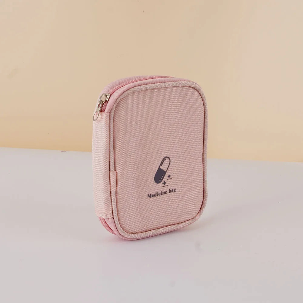 First Aid Emergency Kit Carry Bag Portable Small Carrying Treatment Packs Outdoor First Aid Kit Safety & Survival Travel Packing Peaceful Pleasures Health and Wellness Pink