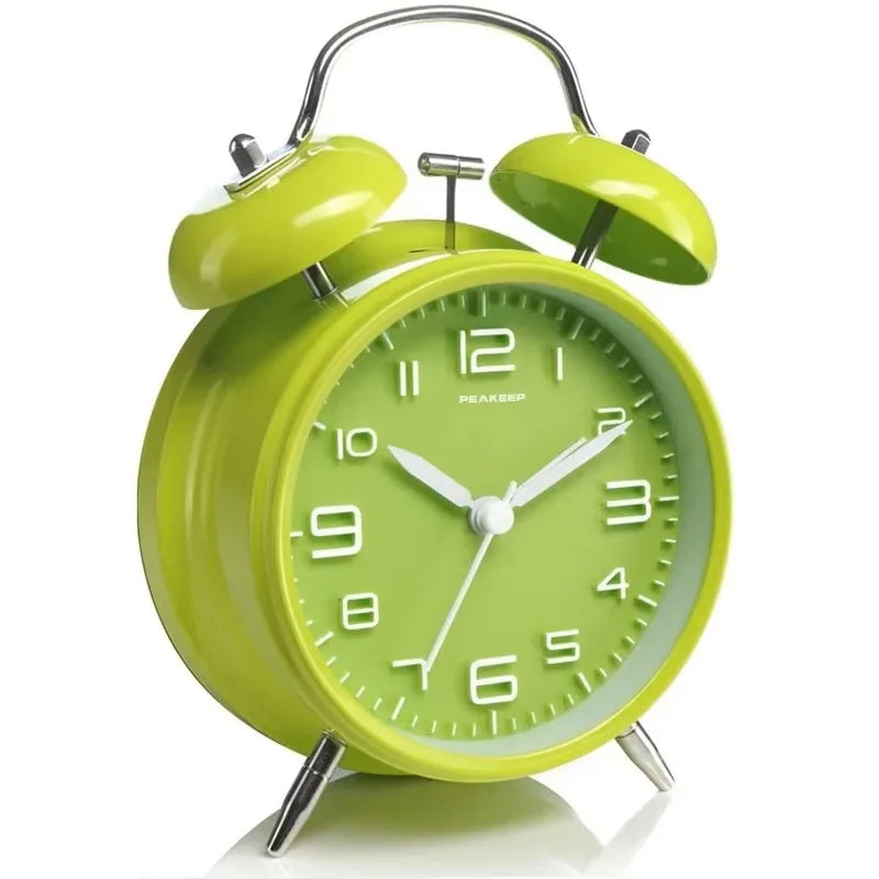 4 Inch Twin Bell Loud Alarm Clock Metal Frame 3D Dial with Backlight Battery Operate Desk Table Alarm Clock For Home and Office Peaceful Pleasures Health and Wellness green