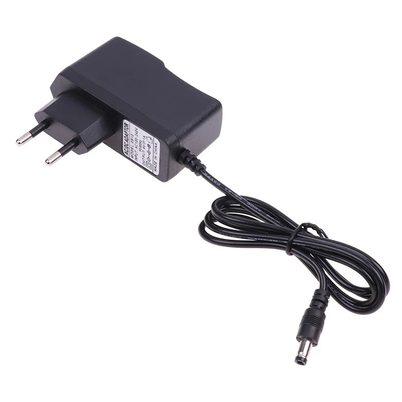 EU Plug Reverse Polarity Charger Adaptor AC 100V-240V Converter Negative Inside Switch AC DC 9V 1A 1000ma Power Adapter Supply Peaceful Pleasures Health and Wellness