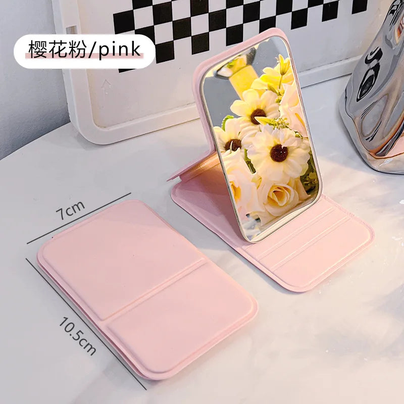Small Makeup Mirror Portable Folding Girls' Touch-up Mirror Creative High-definition Desktop Standing Mini Portable Small Mirror Peaceful Pleasures Health and Wellness Pink-1pcs