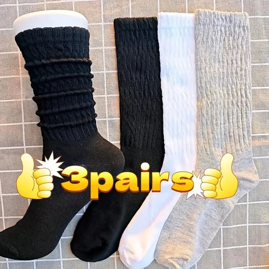 Three pairs of solid-colored black, white, and gray stackable socks, stylish and casual, versatile for various outfits. Peaceful Pleasures Health and Wellness MULTI One Size