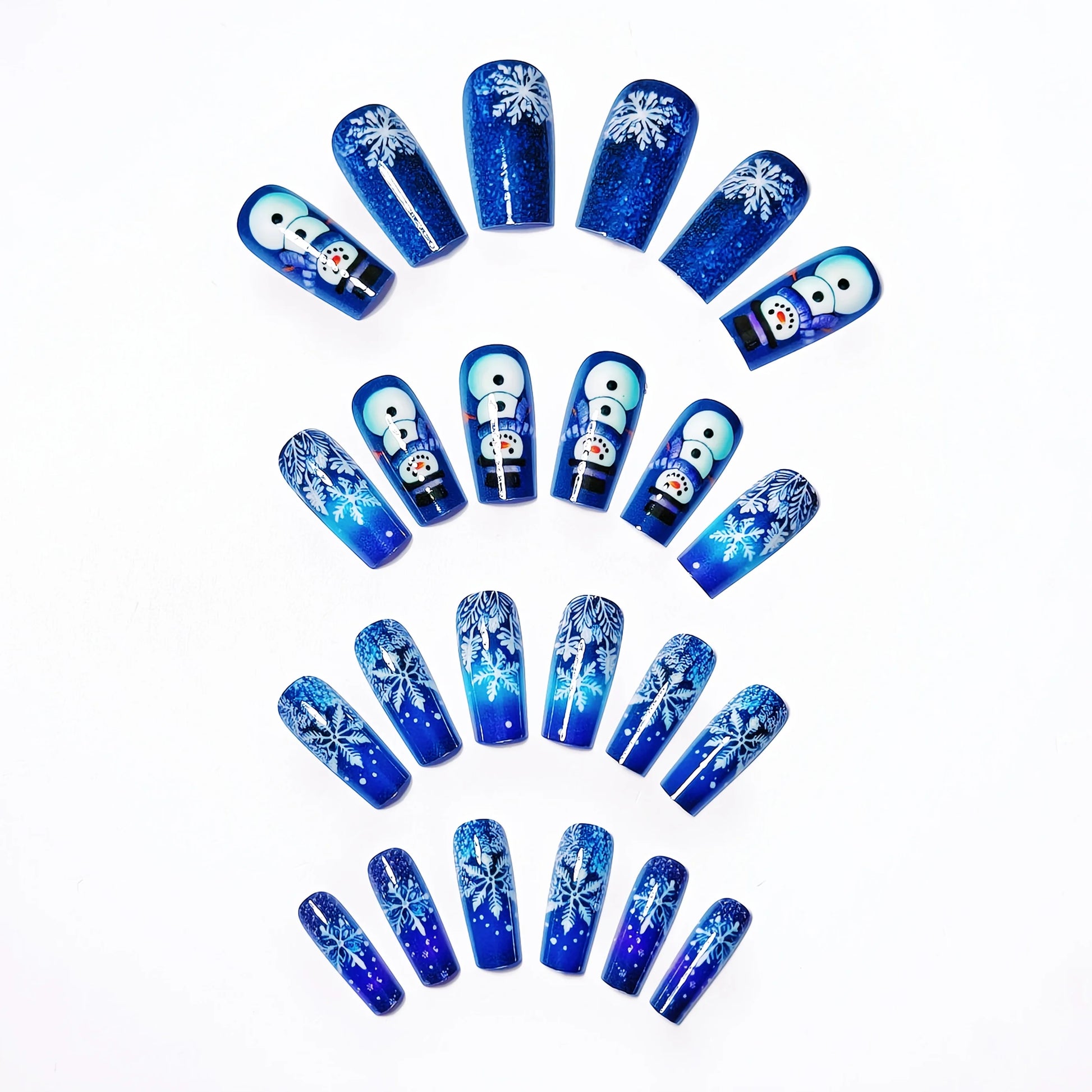 4 pieces of shimmering blue-purple gradient Christmas nail stickers with snowflakes and snowman designs – medium-length, glossy Peaceful Pleasures Health and Wellness
