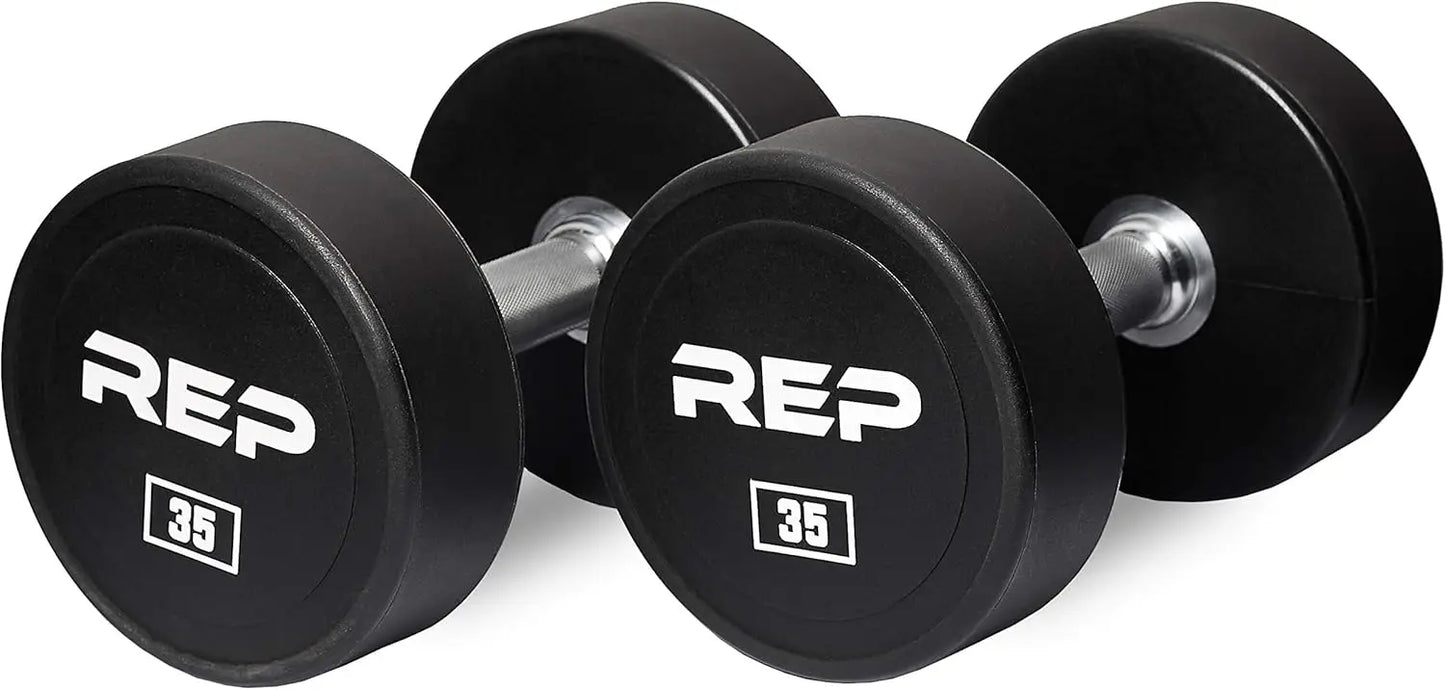 Pair of black dumbbells with 'REP' branding on a white background