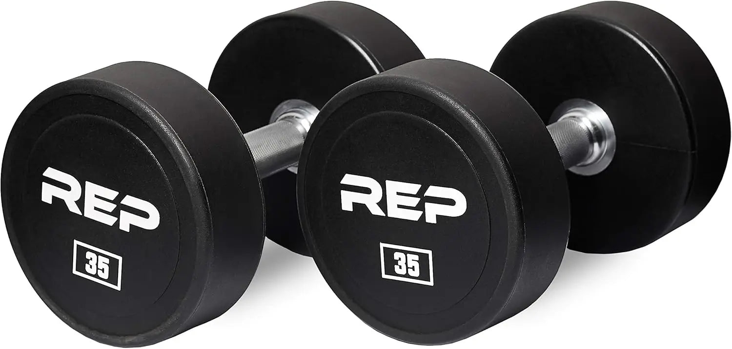 Pair of black dumbbells with 'REP' branding on a white background