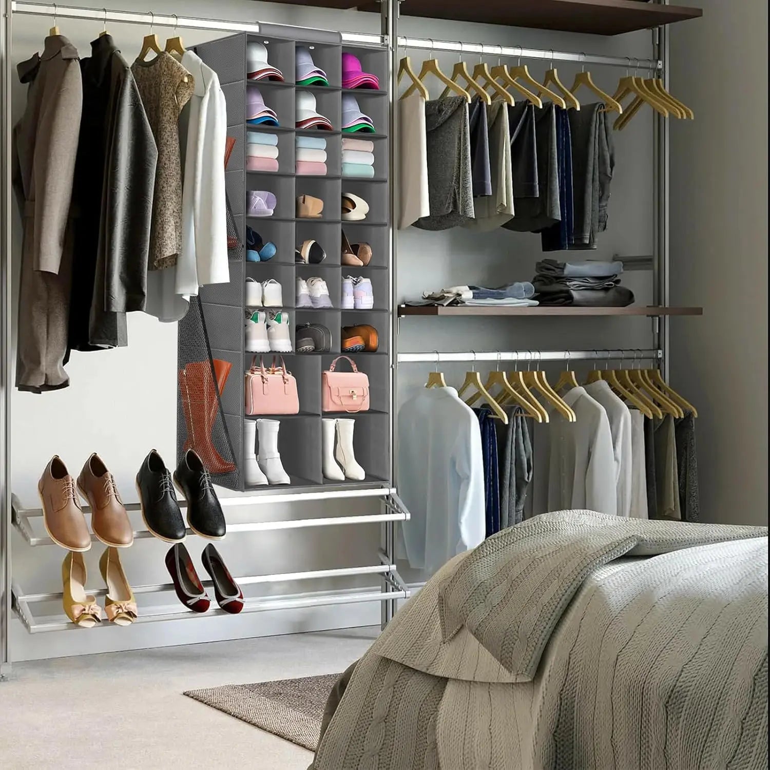 Modern wardrobe with clothes, shoes, and bags organized in a bedroom.