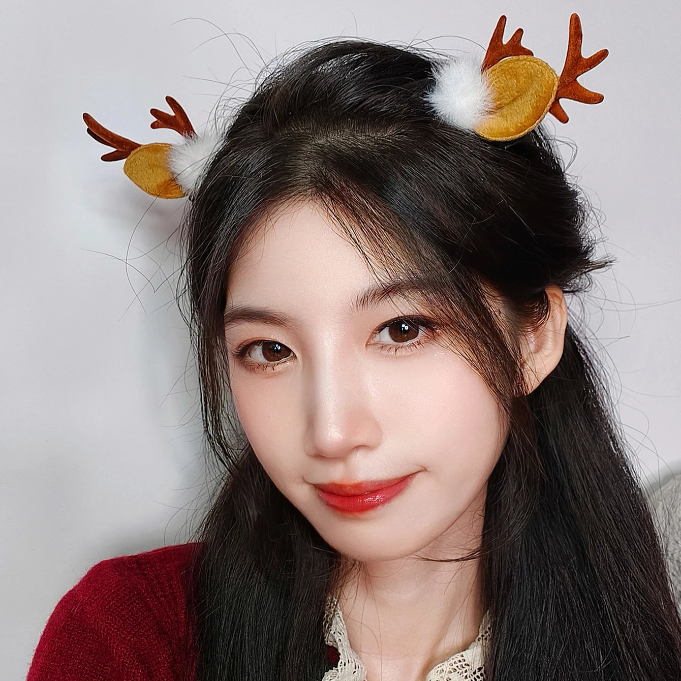 Festive Deer Antlers Hair Clips with Fluffy Pom-Poms Peaceful Pleasures Health and Wellness