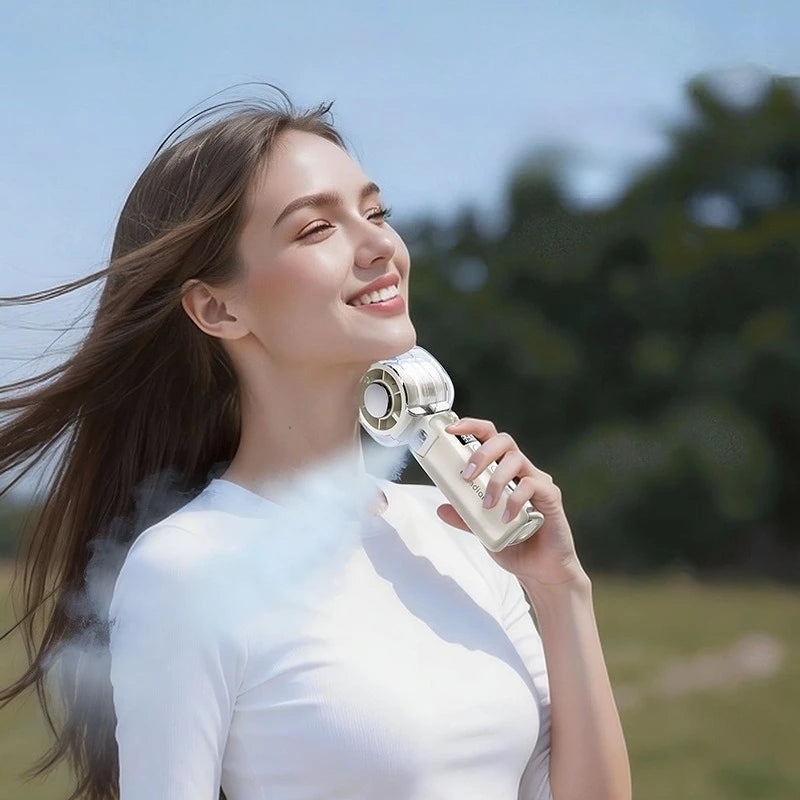 Mini Portable Mist Fan – USB Handheld Spray Cooler for Outdoor