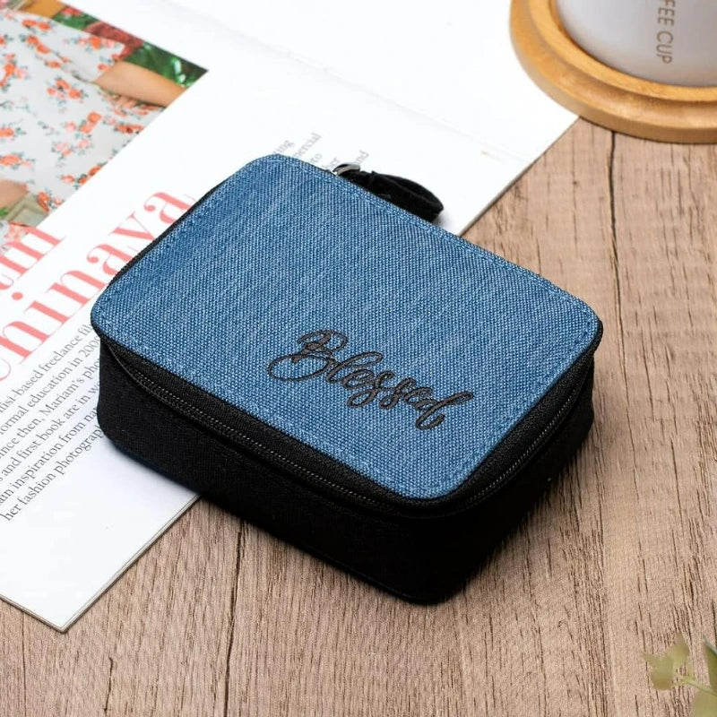 Pill Organizer Case, Weekly Pill Box for Vitamin and Supplement Holder, 7-Day Travel Organizer Medicine Case Peaceful Pleasures Health and Wellness Black with BLUE