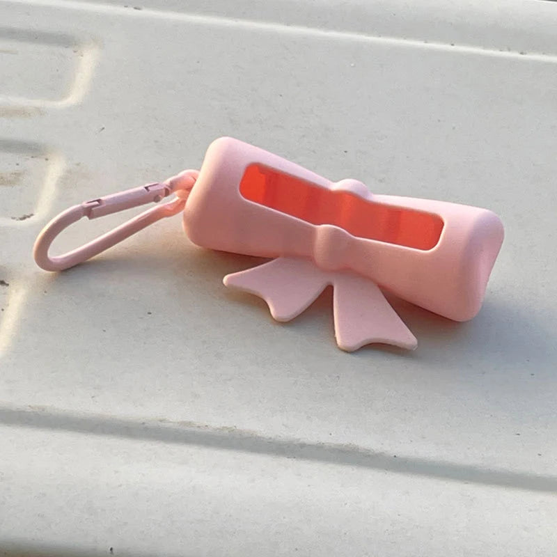 Bow Candy Peanut Shape Silicone Lipstick Cover Keychains Portable Solid Color Lipstick Storage Bag Light Weight Lip Balm Holder Peaceful Pleasures Health and Wellness A Pink